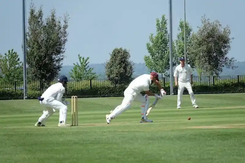 Phil Salt, RCB's English wicketkeeper, gave chase. He tracked the trajectory, positioned himself near the ropes, and leaped to complete the catch